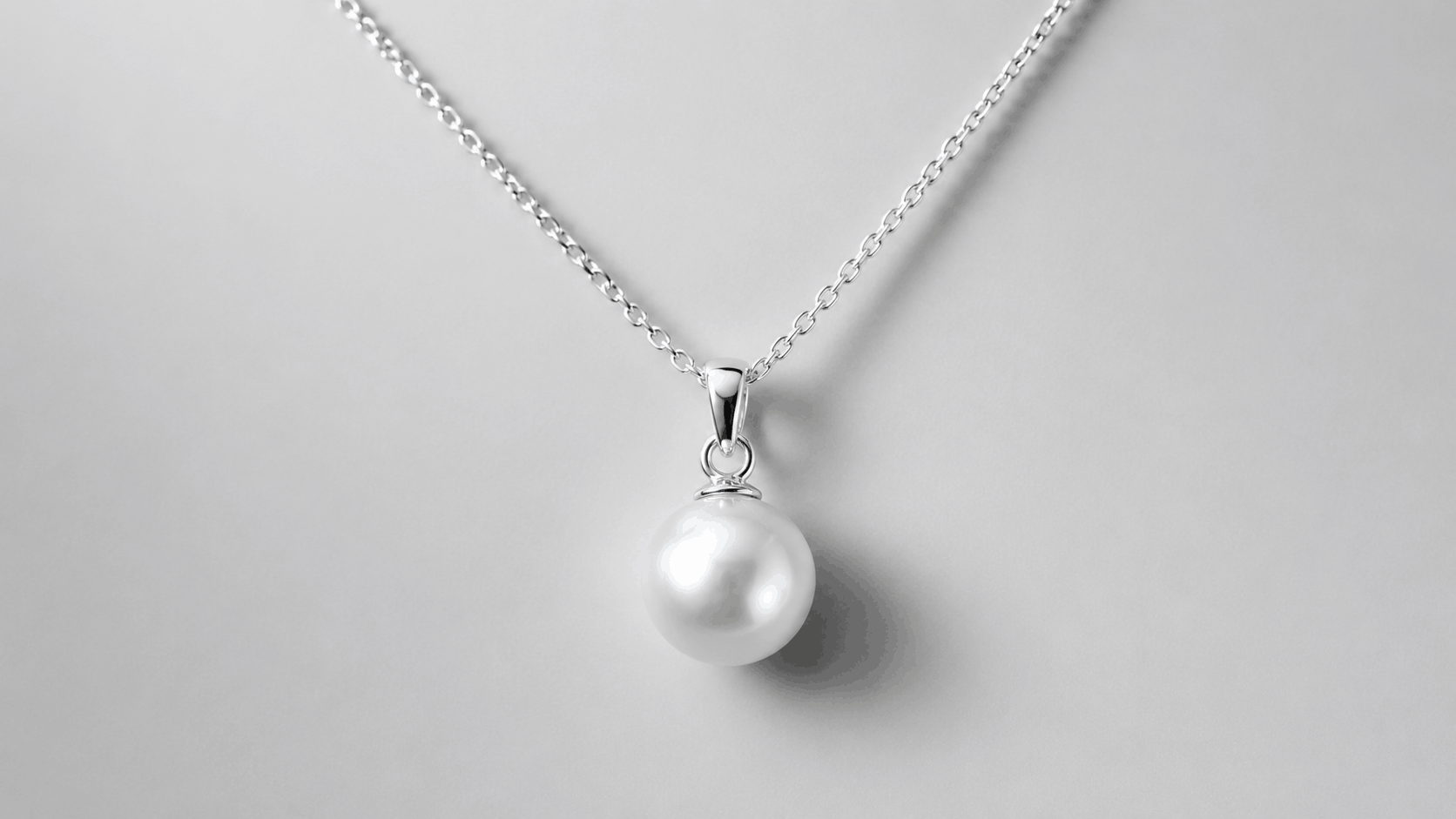 01. Miksi sterlingsilver- ja helmi-kaulakoru toimii